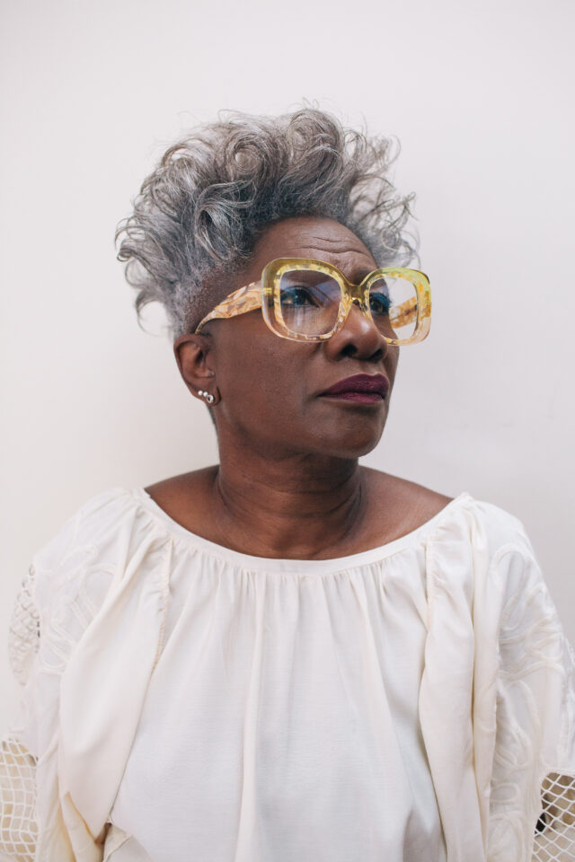 woman wearing yellow glasses