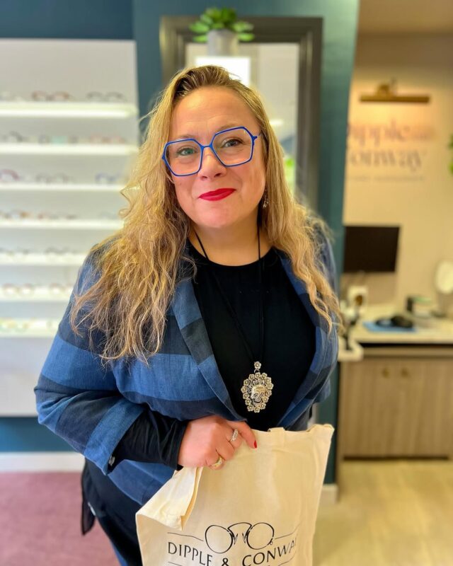 Customer with new blue glasses